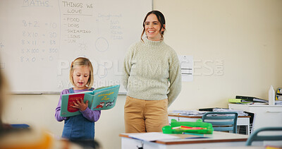 Buy stock photo Kid, teacher or reading book in class for presentation, teaching or language development at school. Storytelling, speaking and girl student with woman for support, oral exam and education with speech