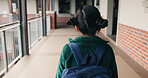 Back, student and walking with girl child outdoor at academy for development or education. Future, growth and study with kid on campus of elementary school for start of curriculum, syllabus or term