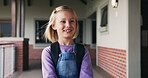 Happy, child and student with backpack at school, education and confident with academic development. Learner, outdoor and kid with smile for cognitive growth, learning and excited for knowledge