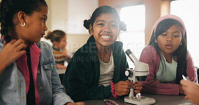 Buy stock photo Science, students and girls with smile for learning, stem education and knowledge in lesson. Microscope, biology or children in lab for chemistry study, research portrait or test experiment in school