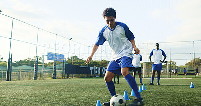 Buy stock photo Pitch, soccer and man with cone for training, game practice and running drills for sports. Football player, person and equipment on field for agile exercise, fitness challenge and ball control