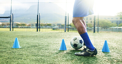 Buy stock photo Legs, soccer and man with cone for sports, game practice or running drills for training on field. Football player, feet and person with equipment for agile exercise, fitness challenge or ball control