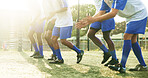 Sport, clapping or legs of football players with warm up for match fitness, team building or flare. Applause, soccer or feet of people on field for competition training, game practice or preparation