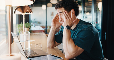 Buy stock photo Remote work, headache and man in cafe with laptop, burnout and tension with discomfort. Frustrated, freelancer and person in coffee shop with technology, brain fog and migraine with dizziness.