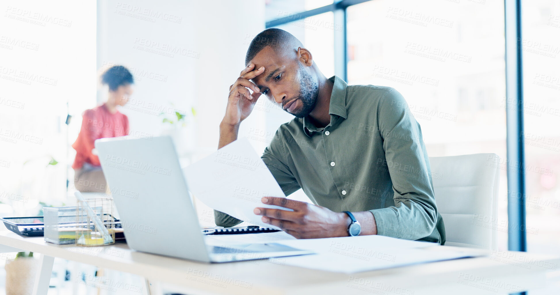 Buy stock photo Laptop, man and stress with documents in office for ad rejection, bad client feedback or headache. Staff, media buyer or worry with report at tech for budget mistake, campaign pressure or overwhelmed