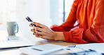 Woman, hands and phone with documents in office for finance, accounting or communication. Female person, employee or accountant typing with smartphone or paperwork for financial planning in workplace