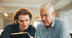 Old man, online and son with tablet in living room, skill development and listen to app explanation. Senior dad, learning and watching tutorial on web, digital literacy and people with tech in house