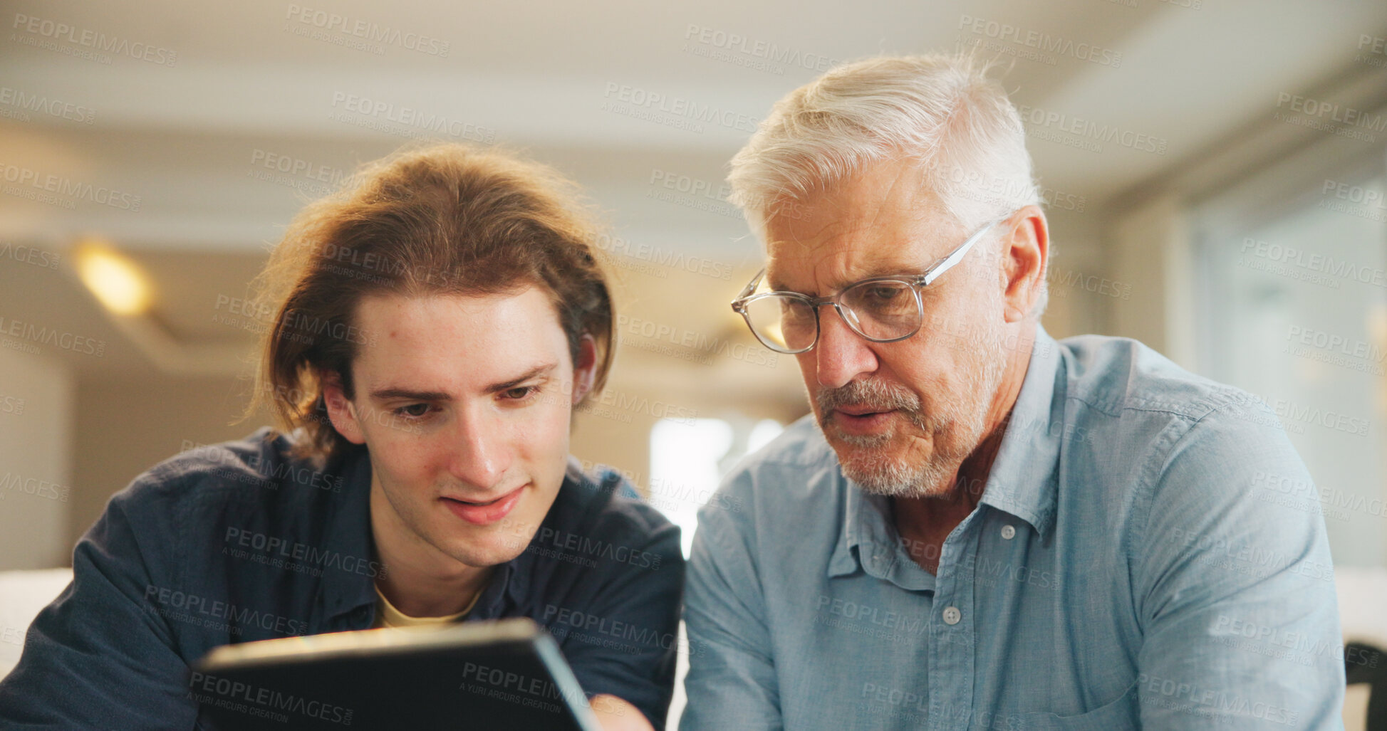 Buy stock photo Old man, online and son with tablet in living room, skill development and listen to app explanation. Senior dad, learning and watching tutorial on web, digital literacy and people with tech in house