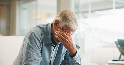Buy stock photo Sad, crying and senior man in home on weekend with loneliness, grief or mourning in living room. Emotion, upset and elderly male person with depression for nostalgia, loss or bad news in house.