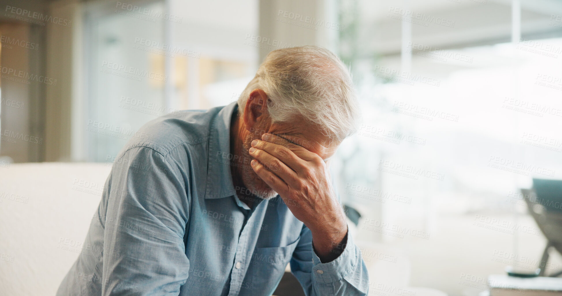 Buy stock photo Sad, crying and senior man in home on weekend with loneliness, grief or mourning in living room. Emotion, upset and elderly male person with depression for nostalgia, loss or bad news in house.