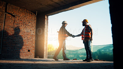 Buy stock photo Meeting, construction and men with handshake in building for agreement, compliance and partnership. Team, architecture and people shaking hands for renovation project, infrastructure and development