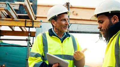 Buy stock photo Outdoor, men and talk with tablet for construction planning, project timeline and renovation update. Smile, worker and foreman with tech on site for building progress, code compliance and teamwork