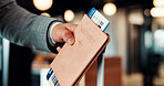 Business travel, employee and hand with passport in airport, immigration and traveler with document. Entrepreneur, international trip and person with boarding pass for flight, suitcase and paperwork