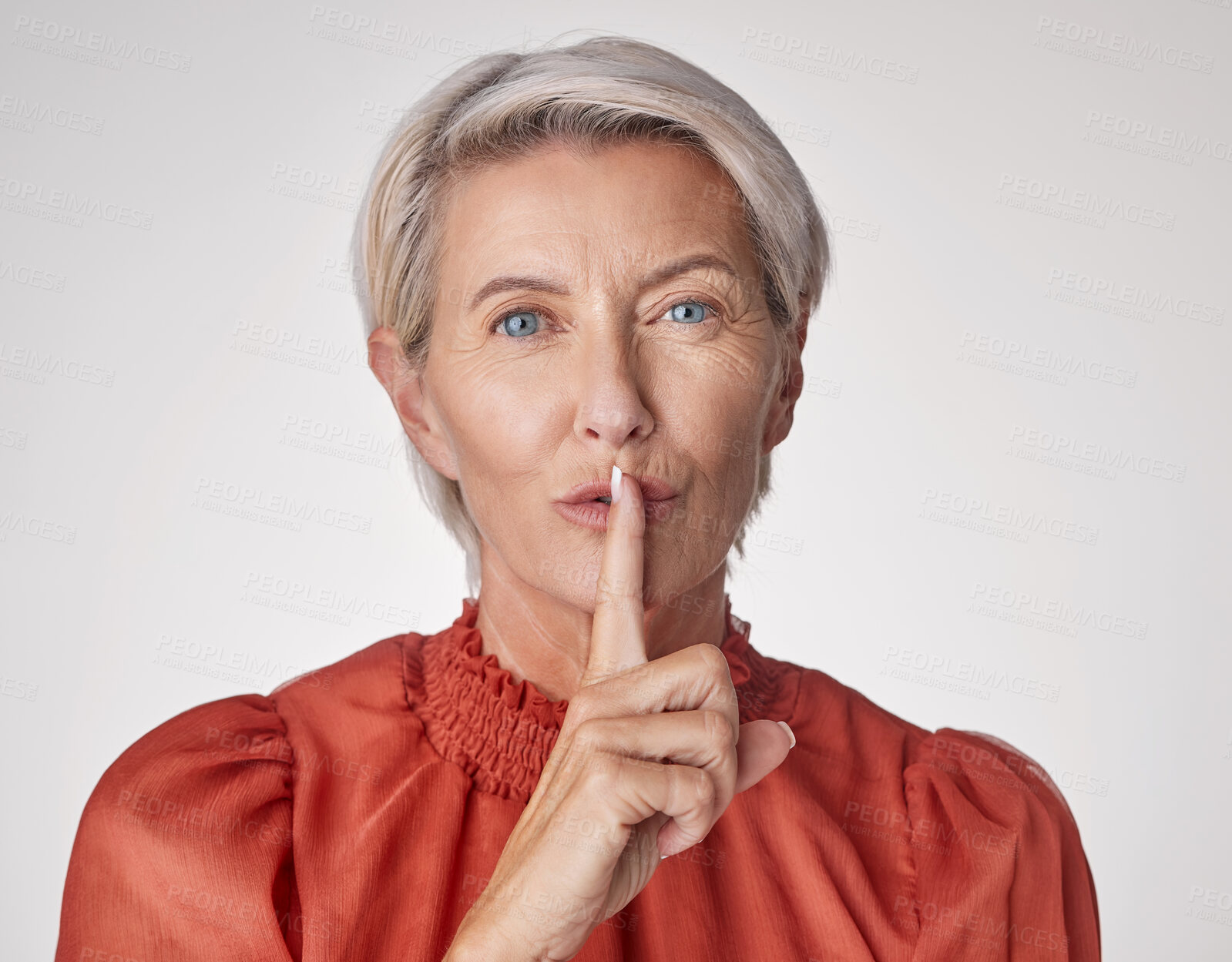Buy stock photo Portrait, woman and secret in studio for beauty or gossip with silent gesture on white background. Skincare, wellness and mature person with hush, quiet or finger on lip for cosmetics or dermatology