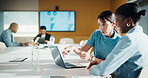 Business, mentor or team in firm with laptop, feedback or advice on investment project. Collaboration, people or finance analyst with tech, budget meeting or manager insight on revenue report.