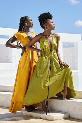 Buy stock photo Fashion, pride and black women outdoor with trendy clothes, modern style and elegant outfit. Confidence, beauty aesthetic and African people with accessories, cosmetics and makeup with blue sky