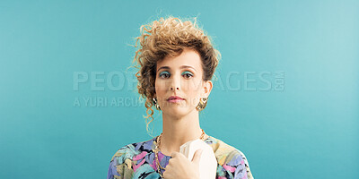 Buy stock photo Fashion, retro and woman in studio with portrait, vintage clothing or funky patterns in 80s aesthetic. Space, colorful and person with confidence, nostalgic prints or classic style on blue background