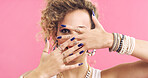 Cover, face and woman in studio with accessories, retro and 80s style for fashion on pink background. Portrait, nails and cool person with hands for jewelry, bangles and rings for funky aesthetic