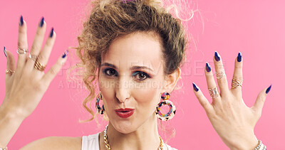 Buy stock photo Portrait, jewelry and woman in studio with retro, funky and 80s style on pink background. Hands, nails and cool person with stylish rings, cosmetics and aesthetic for manicure, showing or expression