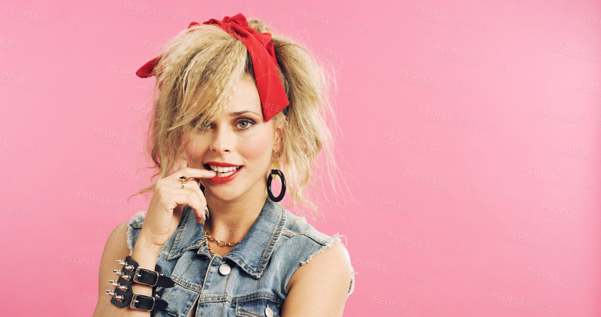 Buy stock photo Portrait, retro and woman in studio with accessories, 80s and fashion style on pink background. Bite, nail and edgy person with confident, punk and flirty expression for funky jewelry with space