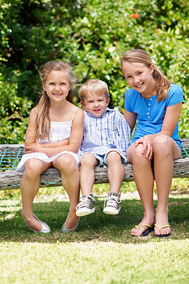 Buy stock photo Family, children and portrait in park with care, sibling love or relationship development with smile. Boy, big sisters responsibility and outdoor with happiness for support, bonding or summer holiday