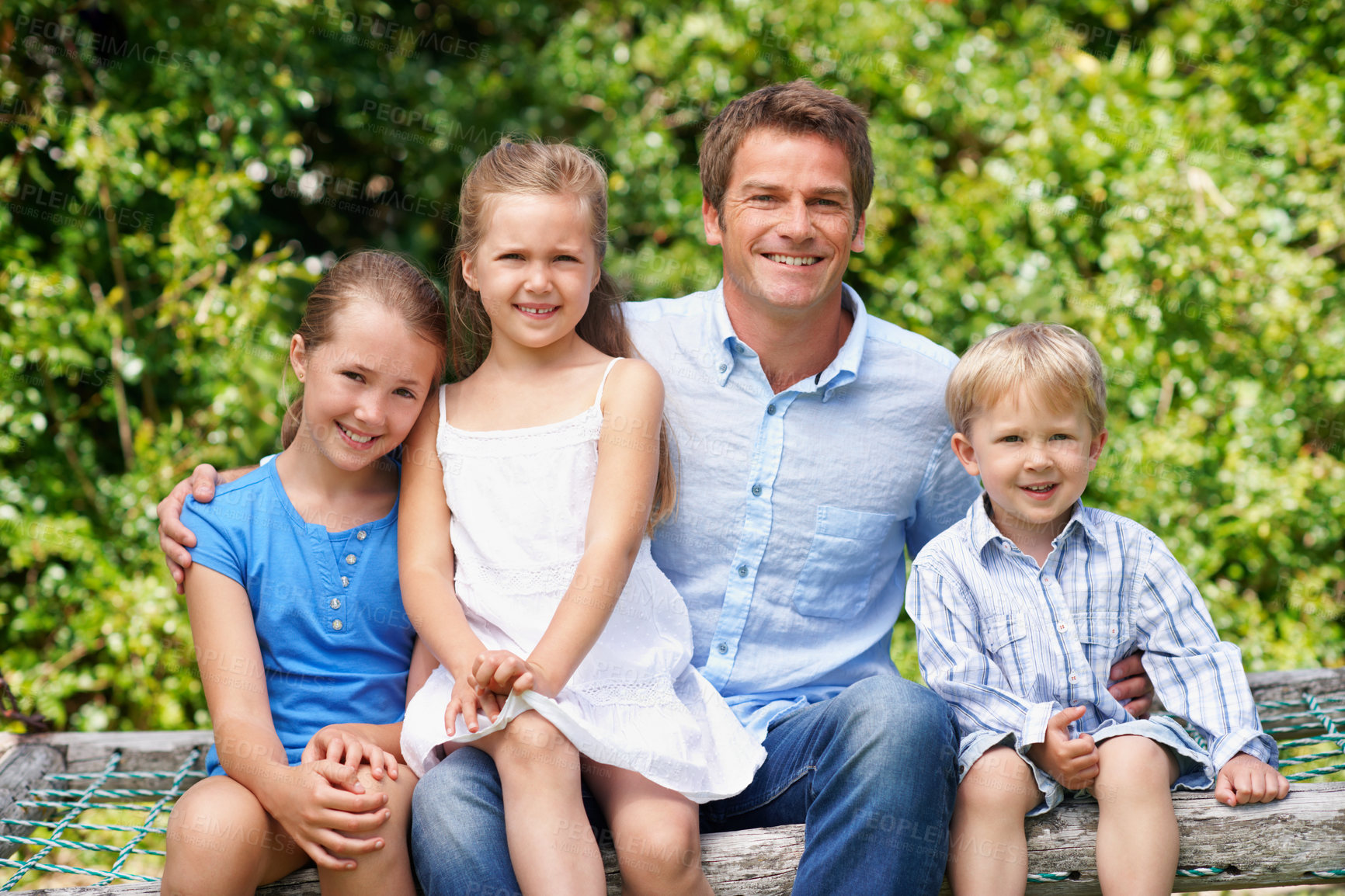 Buy stock photo Dad, children and portrait in park with love, parent care and hug on fathers day. Man, happy and outdoor with kids for family relationship, support and wellness with appreciation for connection