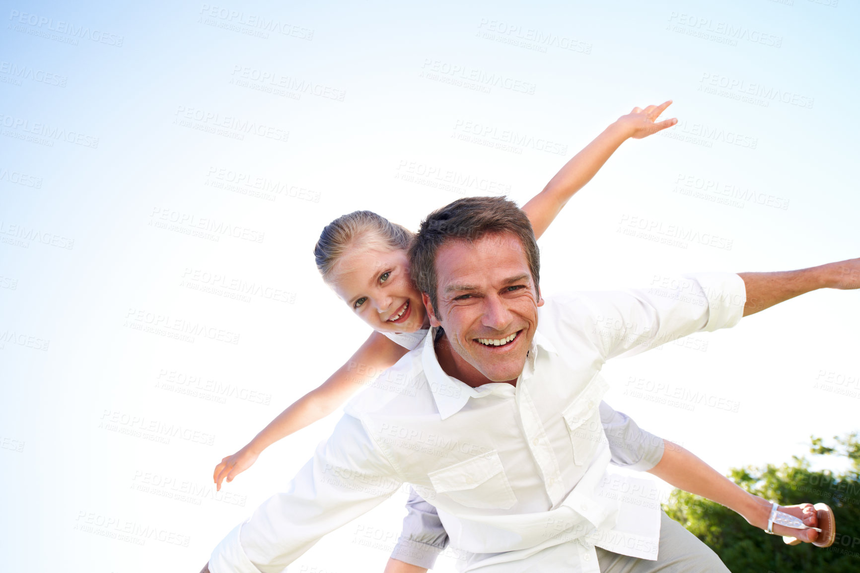 Buy stock photo Portrait, father and flying with child in air for fun activity, airplane games and summer holiday. Space, below and fantasy travel with family, piggyback and weekend break on vacation trip in nature