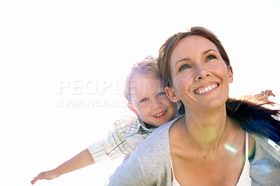Buy stock photo Mom, boy and airplane with smile outdoor for bonding, family time or love with space. Portrait, low angle and relationship with people together for growth, security or game for parent and child