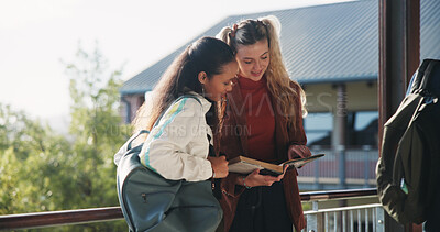Buy stock photo Education, reading and talking with student friends outdoor on campus for recess at college. Conversation, book and learning with women on break at university for information, knowledge or study