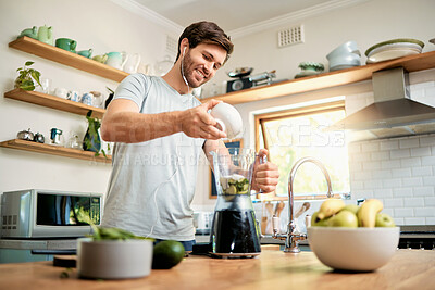 Buy stock photo Earphones, man and yogurt in blender in home for green smoothie, healthy diet or detox shake. Music, happy person or meal prep with ingredients in kitchen for breakfast drink, nutrition or gut health