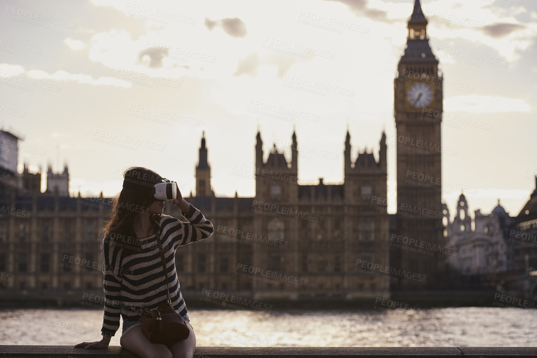 Buy stock photo Holiday, travel and virtual reality with tourist in city for metaverse exploration or tourism. Buildings, space and vr headset with woman outdoor for sightseeing or vacation at Big Ben in London