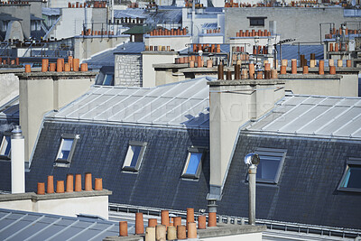 Buy stock photo Rooftop, buildings and city with windows, chimney and urban expansion on horizon in summer. Architecture, skyline and outdoor with infrastructure, structure and landscape with accommodation in town