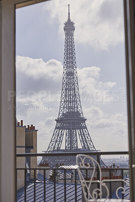 Buy stock photo Eiffel tower, balcony and city with view, rooftop and skyline with clouds, landmark and tourist attraction. Urban town, window and outdoor with steel structure, architecture and monument in Paris