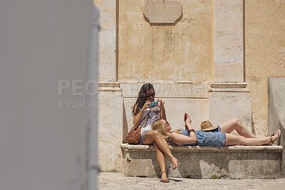 Buy stock photo Phone, holiday and travel with friends in town together for bonding, sightseeing or tourism. Break, digital tech and vacation with women outdoor for memory, photography or adventure for summer