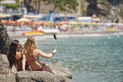 Buy stock photo Beautiful carefree girl friends taking selfies with smart phone in bikini on beach sea lifestyle fun summer adventure vacation