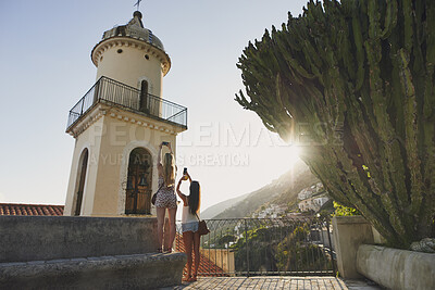 Buy stock photo Travel, photo or friends in town with phone, building photography or sightseeing post on summer vacation. Back, tourism or people outdoor with tech, holiday picture or architecture capture in Italy.