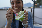 Girl eating icecream gelato on summer vacation
