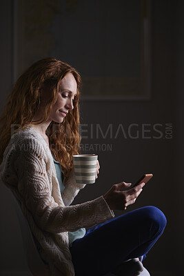 Buy stock photo Night, coffee and woman with phone in home, browsing social media and connectivity for internet video. Ebook, reading message and person with mobile for late texting, relax or beverage for smile