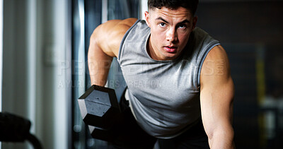 Buy stock photo Fitness, portrait or man in gym with dumbbell, weightlifting power or renegade row in bodybuilding. Exercise, serious or person with equipment, intense workout or strength in muscle development.