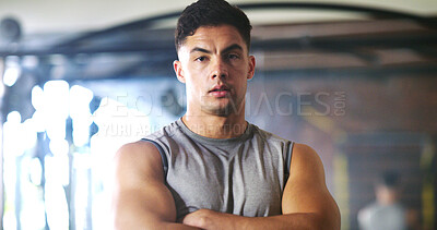 Buy stock photo Fitness, portrait and man with arms crossed in gym, bodybuilder and confident for muscle development. Health club, athlete and person with pride for body goals, serious and training for wellness