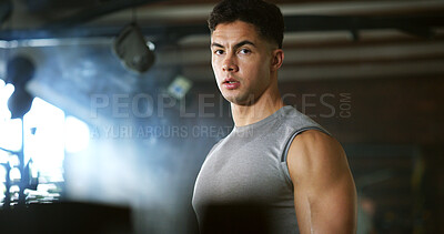 Buy stock photo Portrait, tired and man in gym for fitness break, wellness and recovery from body building exercise. Serious, athlete and person in health club for muscle rest, breathing and fatigue for challenge