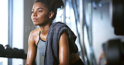 Buy stock photo Fitness, fatigue and woman in gym, thinking and rest with intense training recovery for wellness. Break, sweating and tired African person in exercise club to cool down, reflection and health