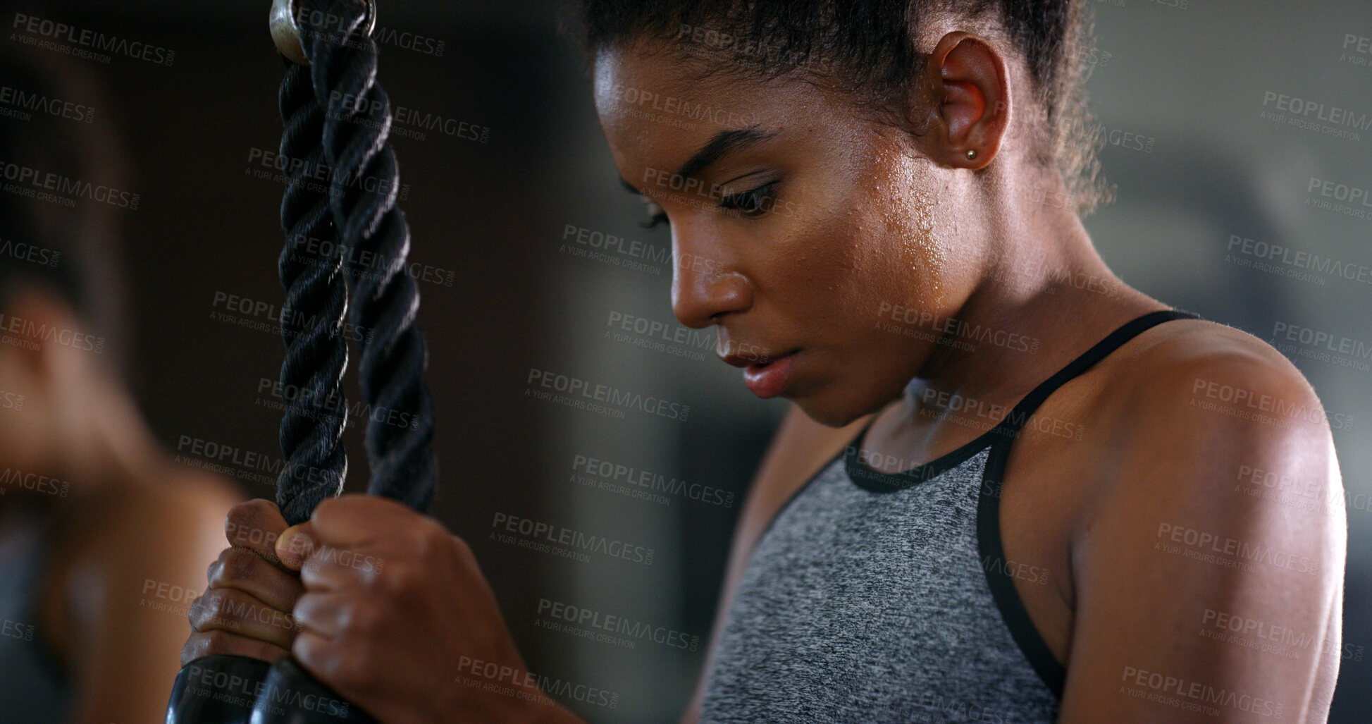 Buy stock photo Fitness, woman and rope machine in gym with workout, strength training and movement for wellness. African person, sweating and athlete in health club for bicep exercise, cable equipment and gear.