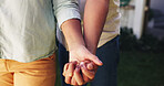 Holding hands, love and tattoo with couple outdoor for empathy, connection and trust. Marriage commitment, kindness and loyalty with man and woman in backyard for solidarity, body art and compassion