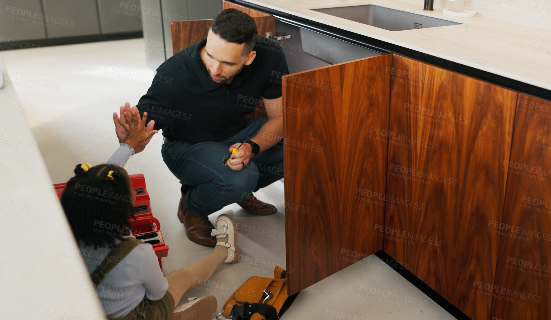 Buy stock photo High five, toolbox and dad with girl in kitchen for bonding, support and DIY plumbing or repair. Handyman, pipe maintenance and teaching with man and daughter in family house for fixing together