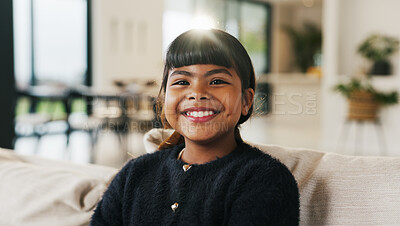 Buy stock photo Portrait, child and relax on couch with smile, positive attitude and childhood development in lounge. Happy, young girl and adorable kid comfortable in home with growth, chill and weekend break.