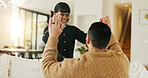 Dad, daughter and high five in living room with smile, support and encouragement for child development. Father, girl kid and celebration in home with trust, family connection or motivation for growth