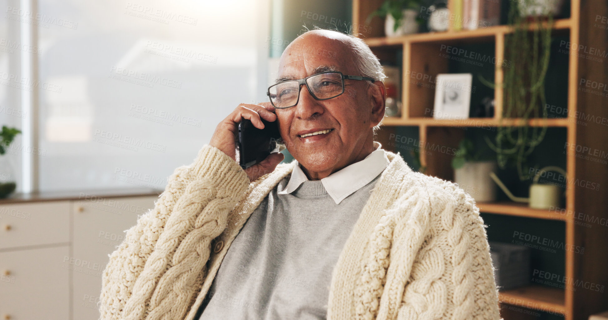 Buy stock photo Phone call, conversation and old man in home for communication or thinking of contact. Happy, relaxed and senior person with mobile discussion for pension question, connection or interaction