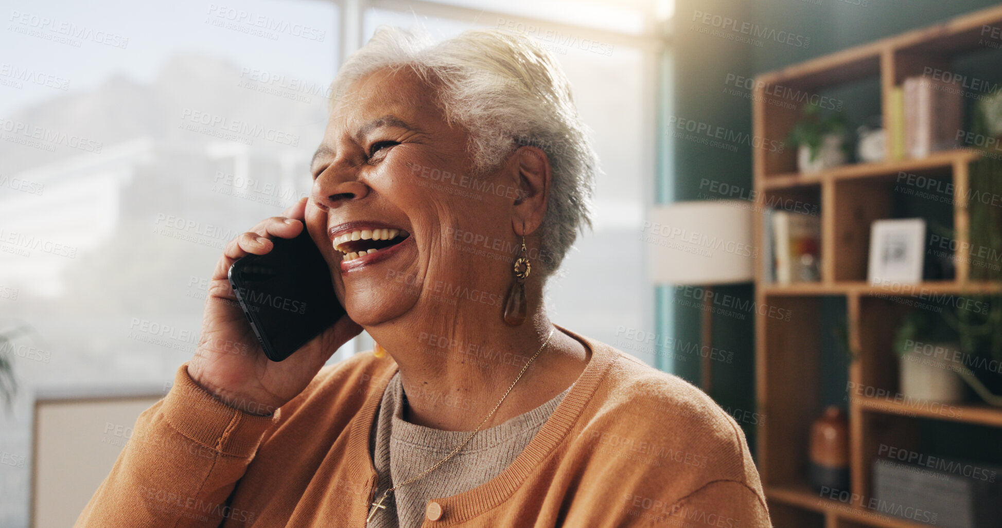 Buy stock photo Funny, phone call and senior woman in home for communication, news or connection in retirement. Mobile, elderly person and talking to contact for story, joke and laughing with gossip at apartment