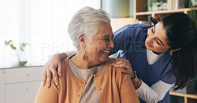Buy stock photo Home, nurse and senior woman with talking, funny conversation or support for wellness. Caregiver, retirement and elderly patient with smile for friendly discussion, health or medical service